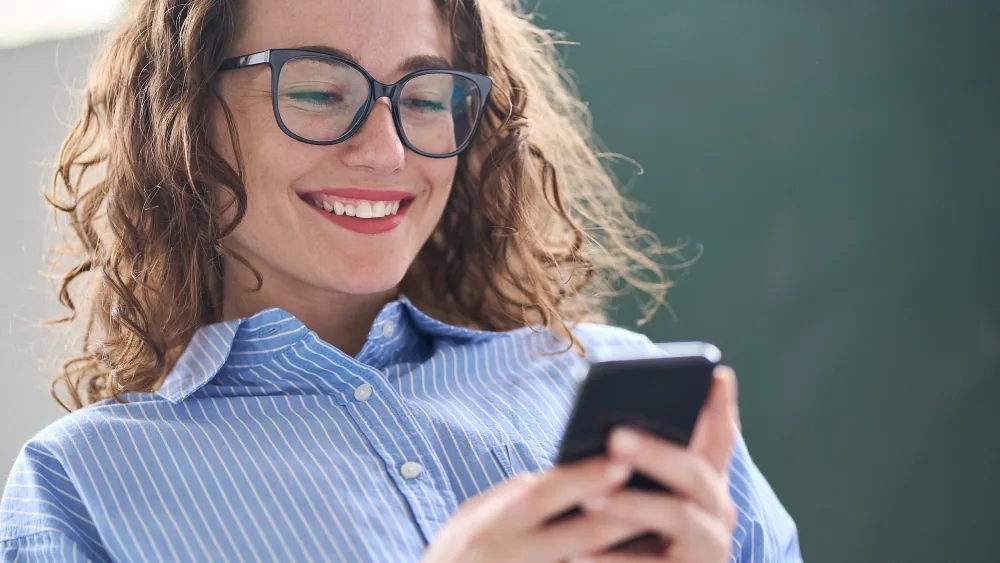 Woman on her phone texting